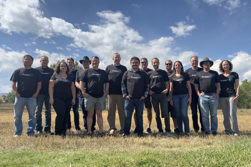 Team photo in logo shirts